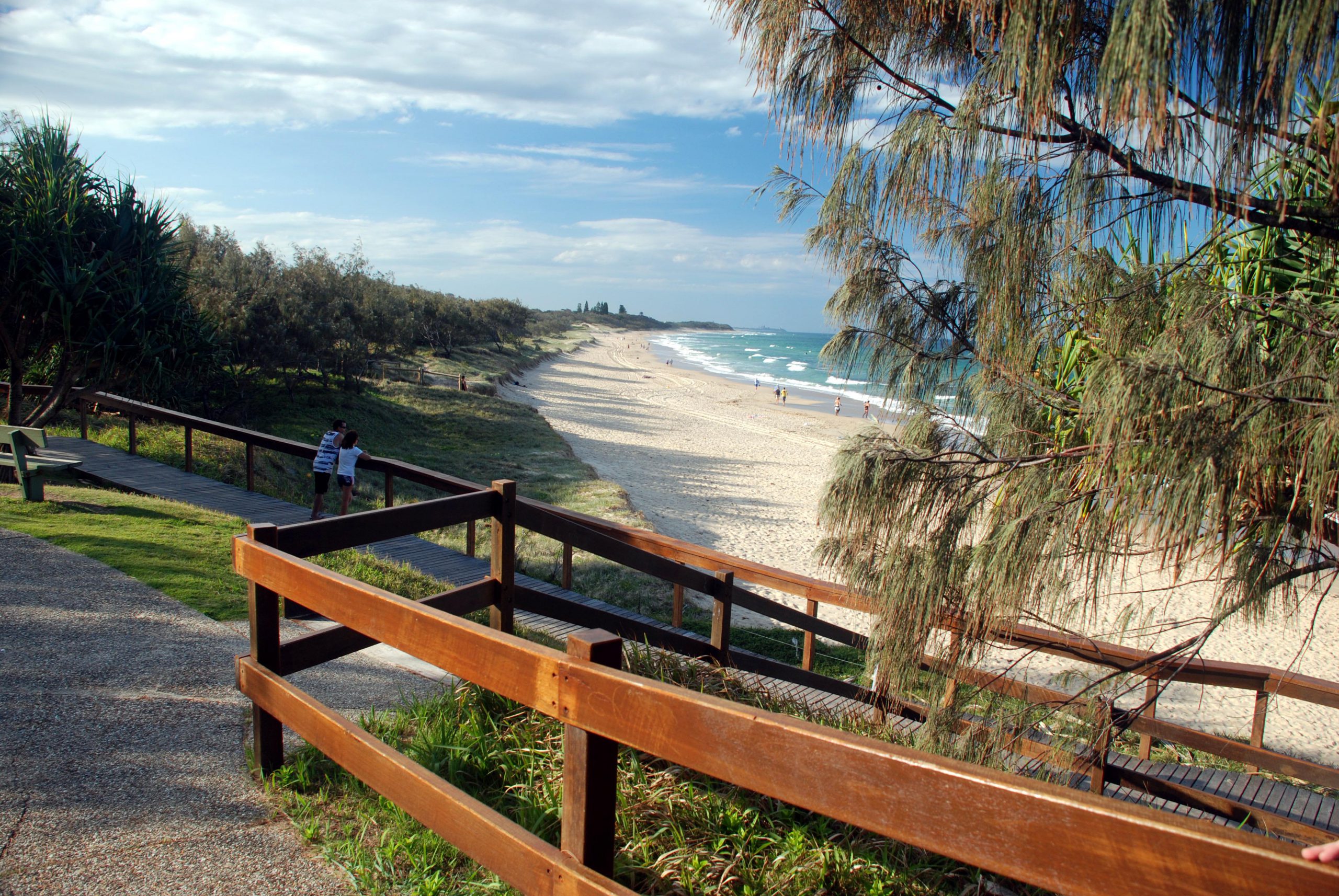 A timber boardwalk and access path leading down to Currimundi Beach on the Sunshine Coast